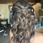 lots of twists in this half up half down hairstyle