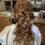 tight curls and braid for wedding hairstyle