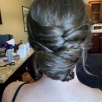 tucked and twisted updo for an elegant bridal look at a lake tahoe wedding
